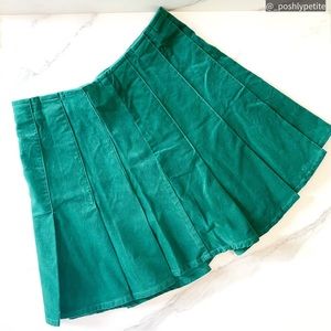 Forever 21 s green velvet mini pleated skirt